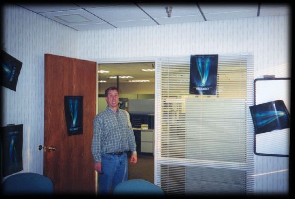Tom surprised at the posters.