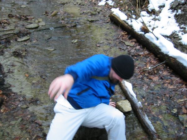Me breakdancing in a creek.